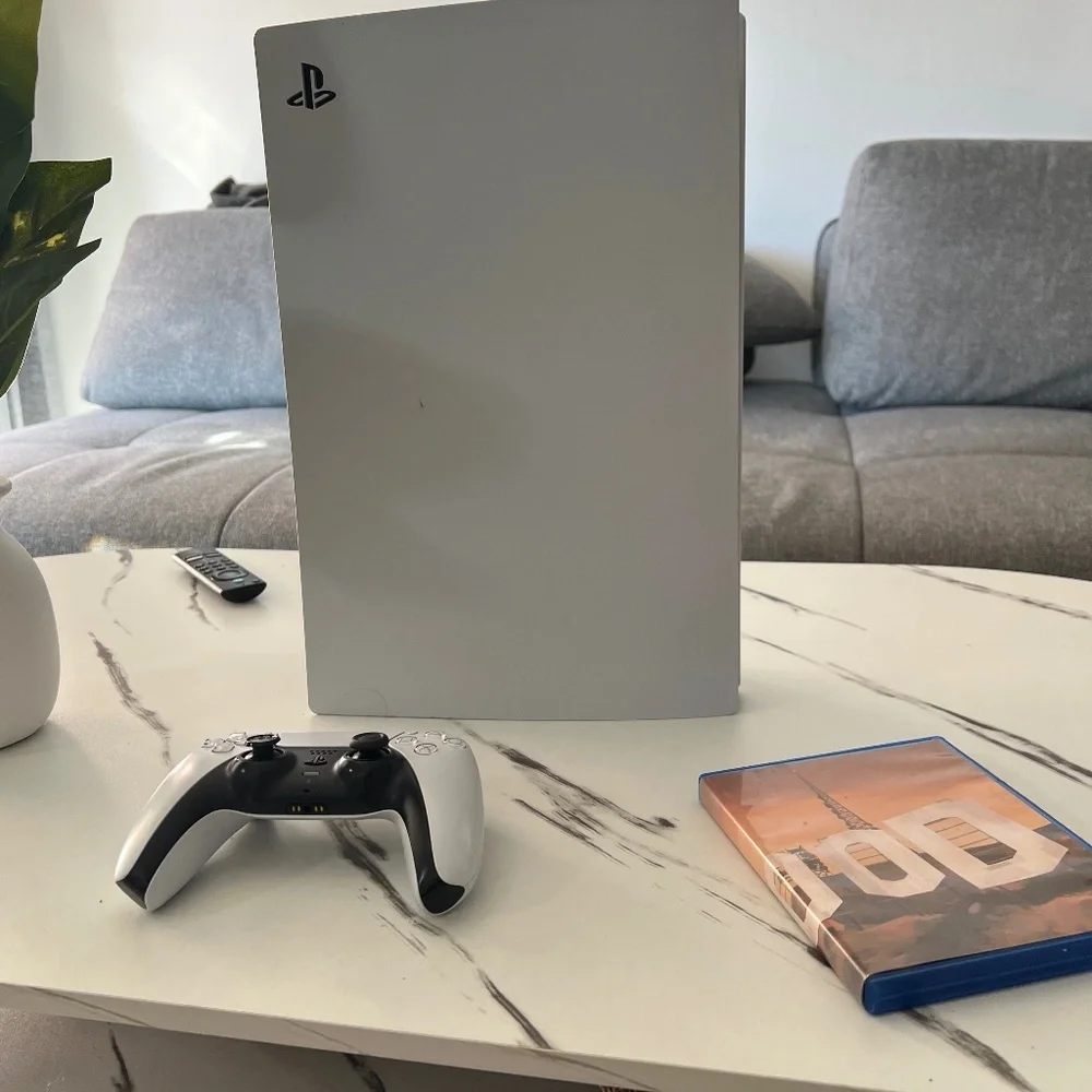 PlayStation 5 with controller and GTA 5